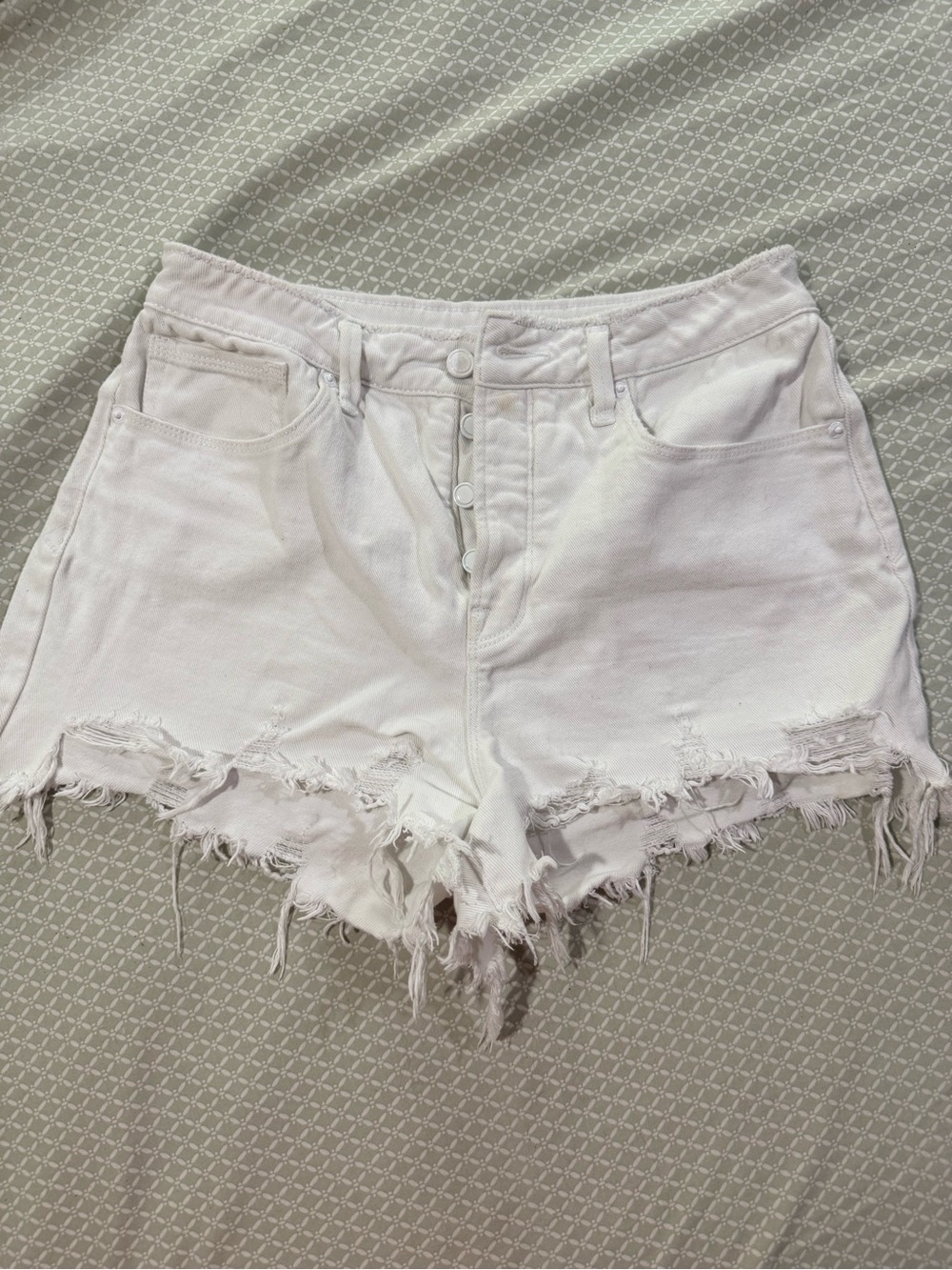 Good American Distressed Button-Fly White Denim Shorts